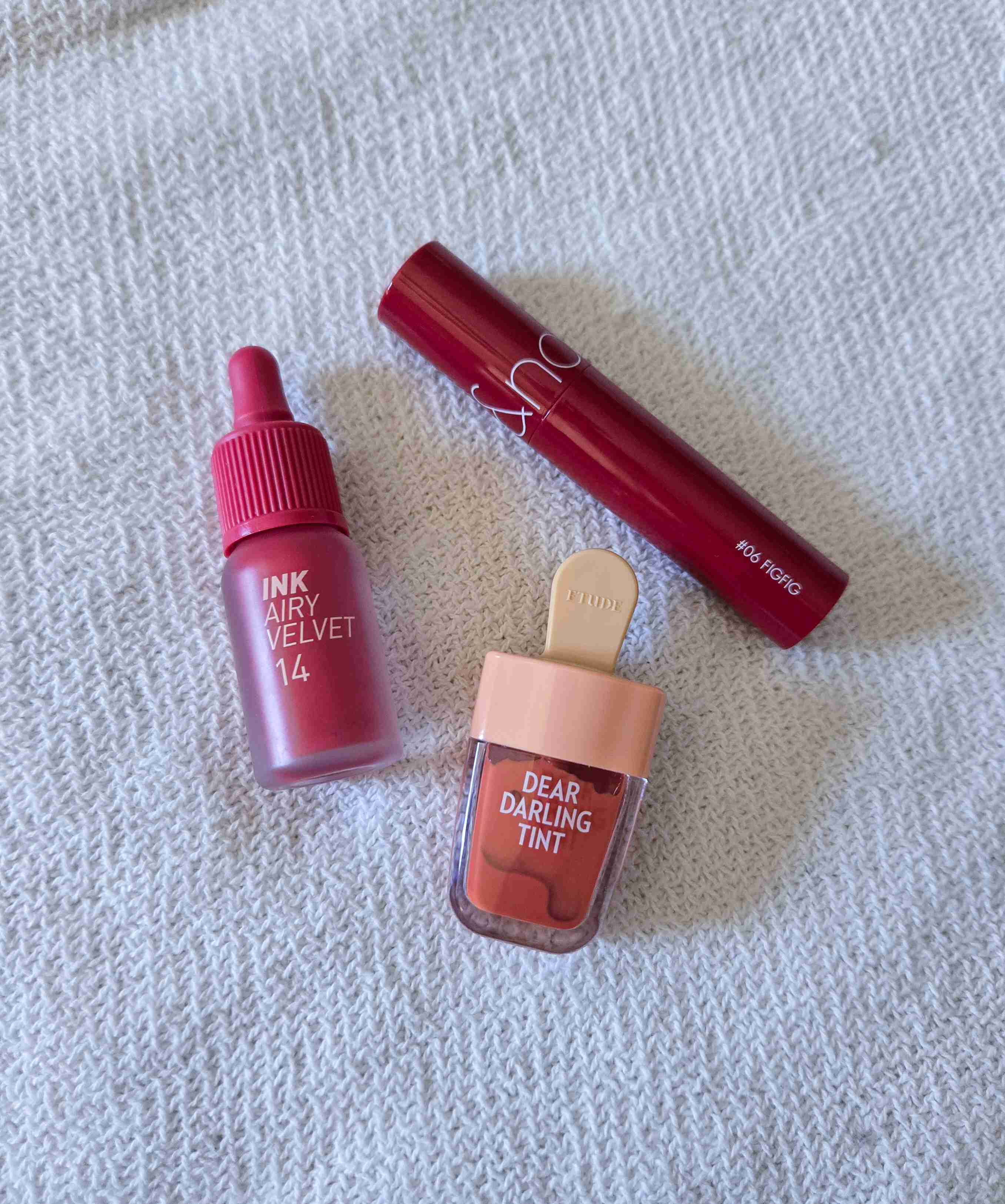 The Best Lip Balms, Lipsticks, and Lip Treatments That Actually Work cover photo collage